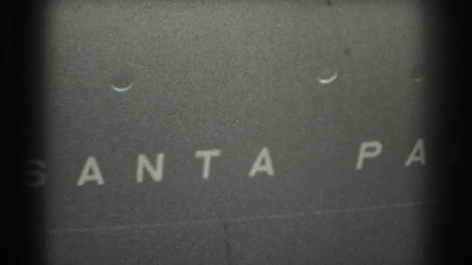 1939 San Francisco 8mm frame with the Santa Paul name partly visible, cropped by dark gate edges and soft focus.