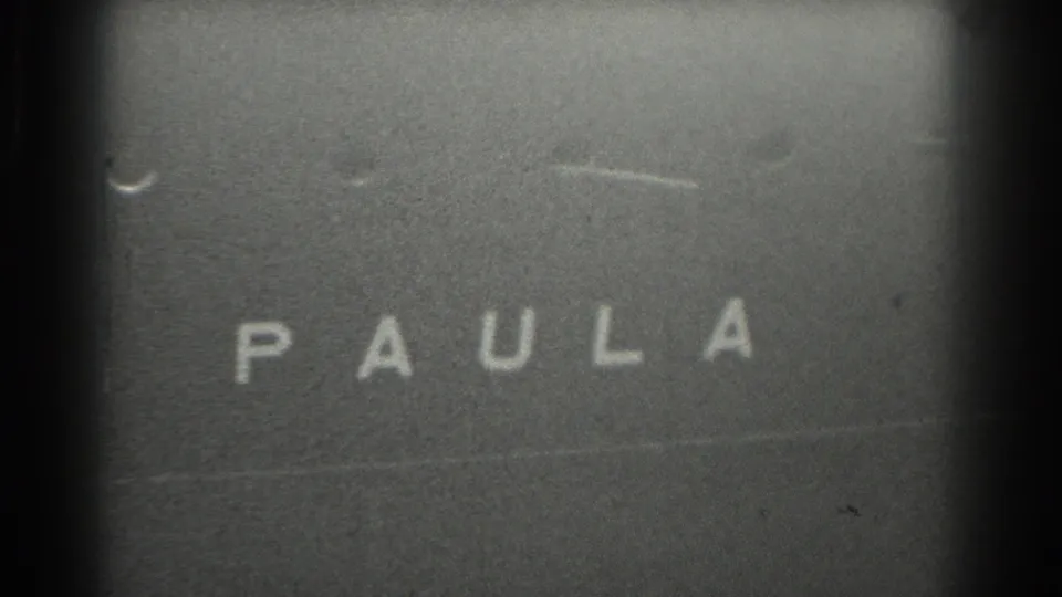 1939 San Francisco 8mm frame holding on the vessel name PAULA with grain, scratches, and cropped framing.
