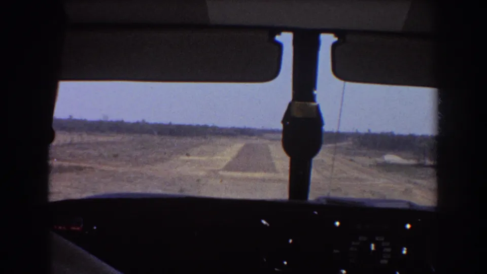 1967 home-movie cockpit view toward a runway during an aircraft approach in Australia.