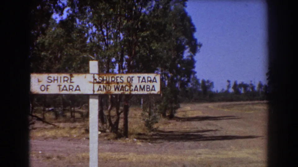 Weathered roadside sign for the Shire of Tara and Shires of Tara and Waggamba in supplied 1967 Australian travel footage.