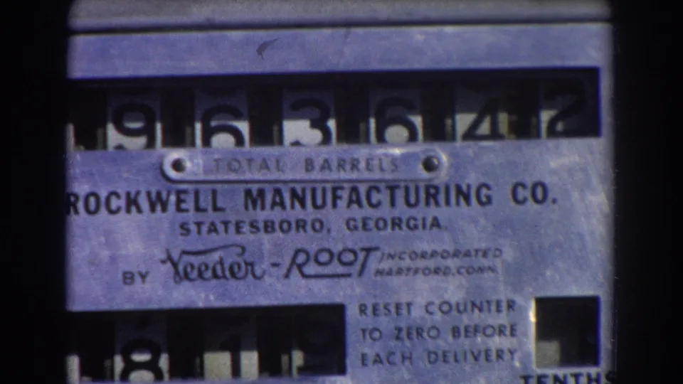 1967 Brisbane archival frame of a metal mechanical TOTAL BARRELS counter, with Rockwell Manufacturing Co. lettering and partial lower digit window.