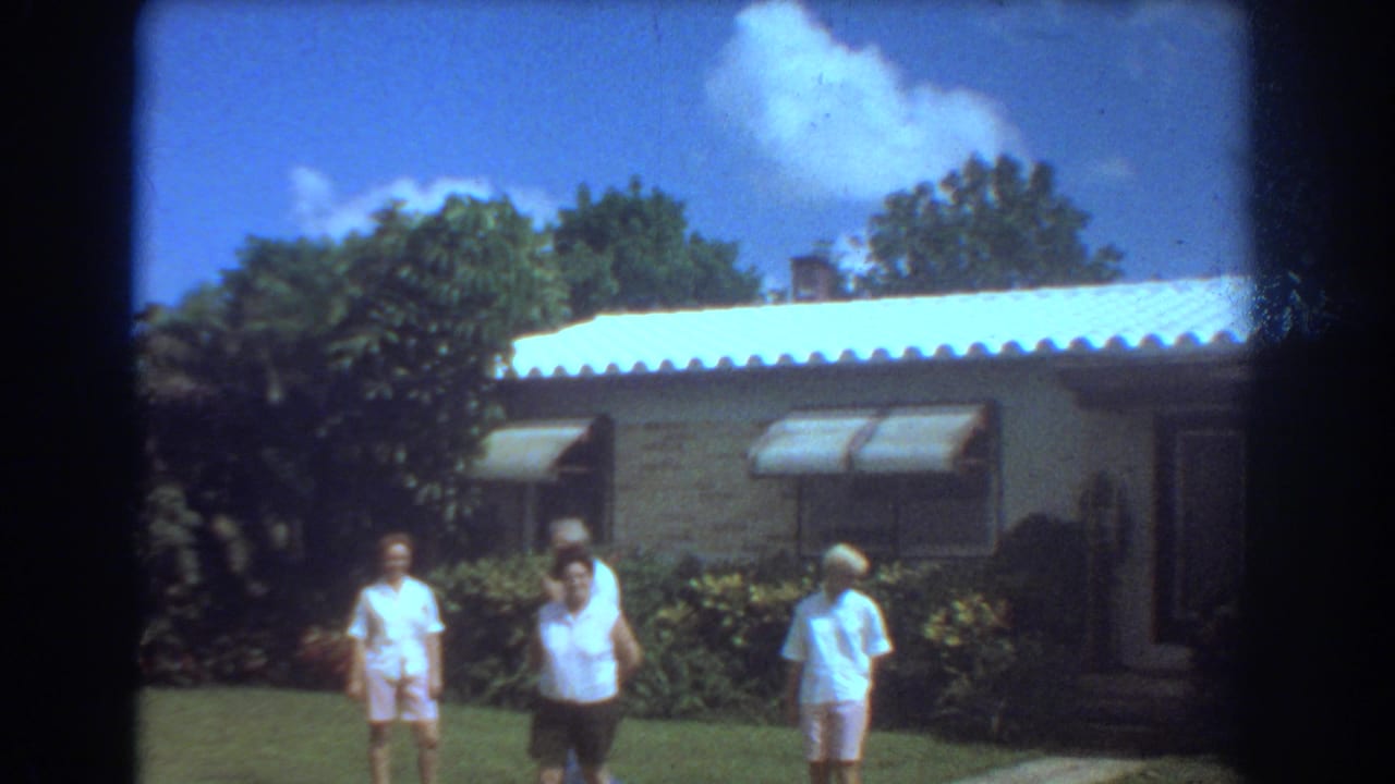 Near the end of the 1967 Fort Lauderdale shot, three older adults are clearly visible in front of the suburban house.