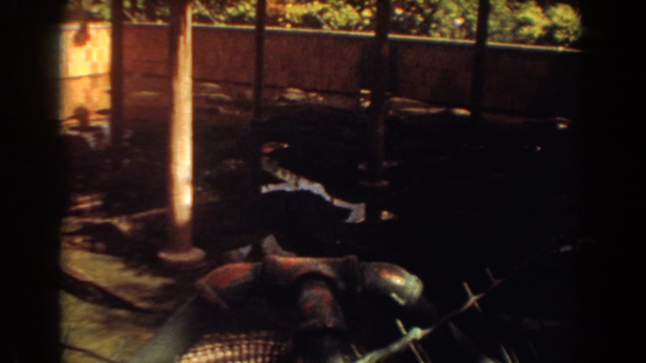The final frame shifts to a darker view of a fenced water or enclosure area with a vertical post and surrounding vegetation.
