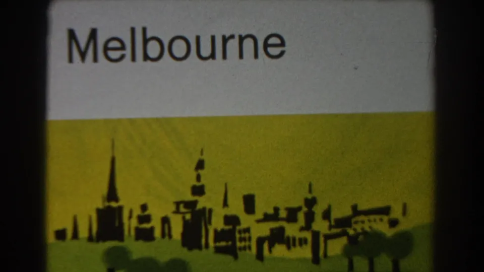 1967 Melbourne title frame with silhouetted skyline graphic and visible film softness at the frame edges.