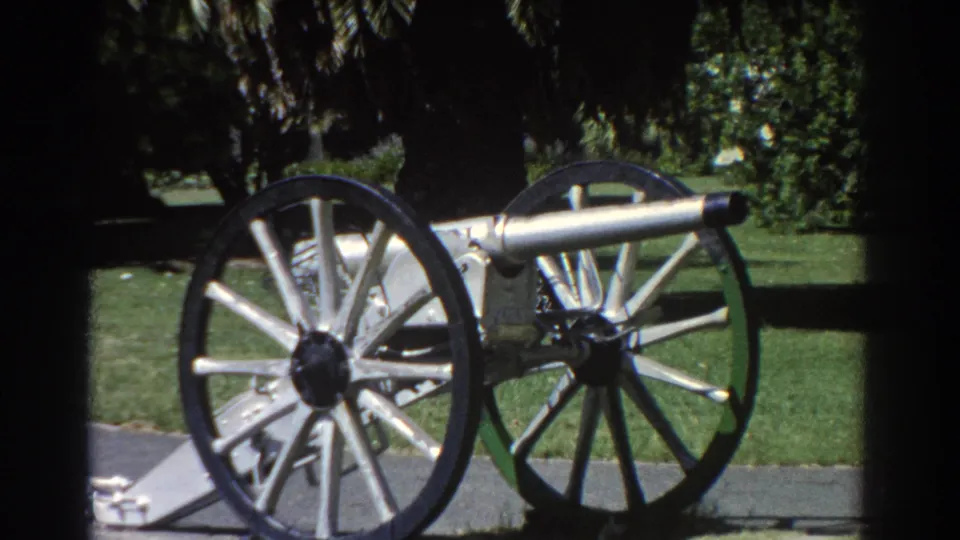 1967 Perth footage shows the restored cannon from a steady visitor viewpoint, emphasizing the wheels and metal carriage.