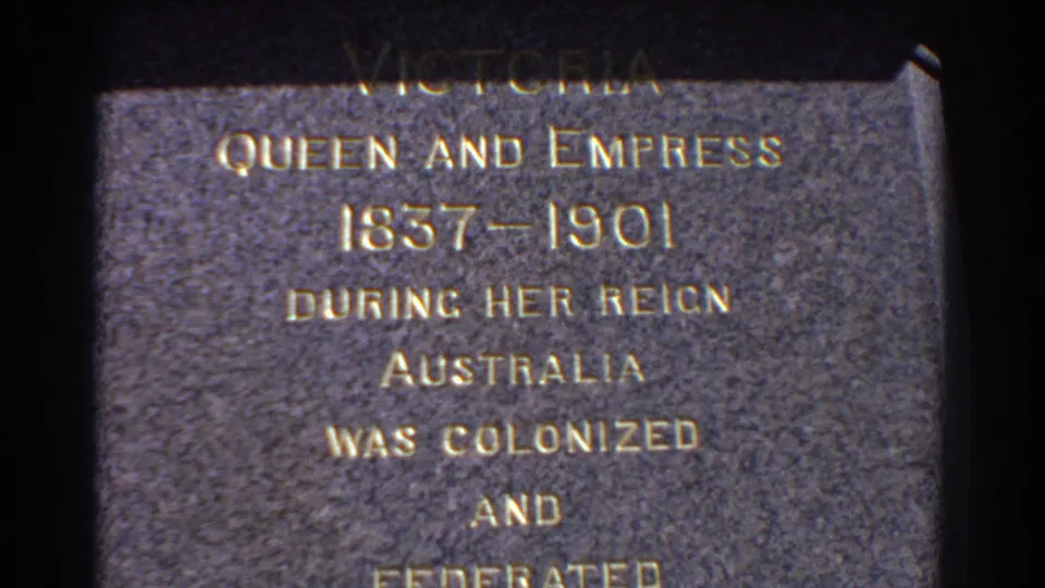 1967 Perth 8mm frame showing a close-up plaque for Queen Victoria, partly cropped at the top and bottom.