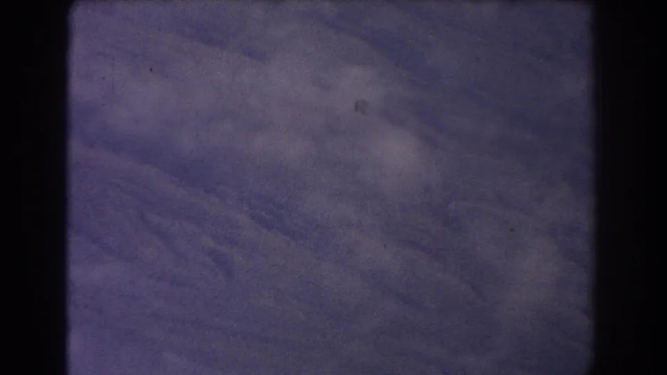 Close 8mm view of a purple textured surface, slightly soft, with scratches, dust, and dark gate edges from the Sydney 1967 metadata.
