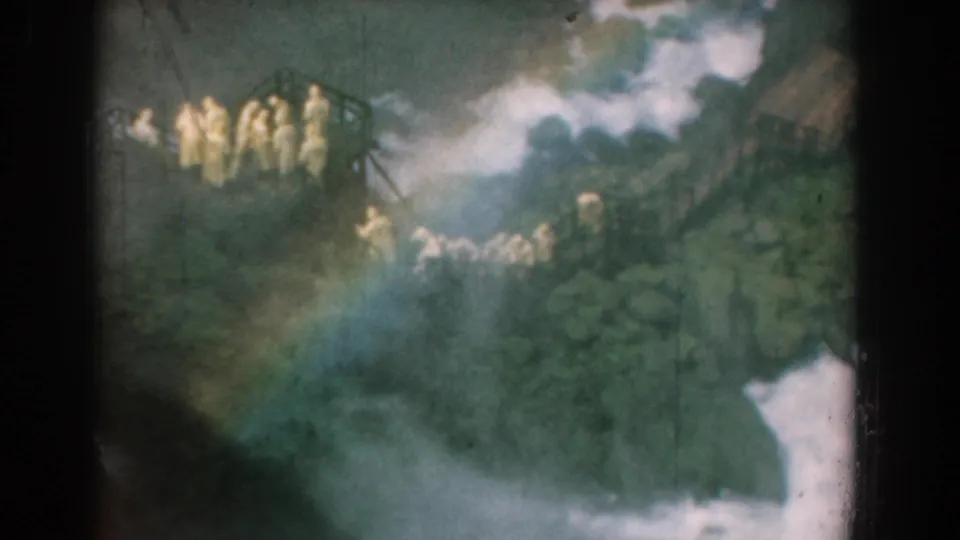 Late in the clip, the platform group and lower figures remain visible through soft 8mm color, trees, and mist in Yorktown, Virginia.