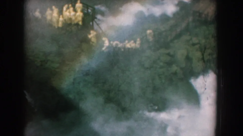 1958 8mm Yorktown, Virginia footage showing whitewater, mist, dark rocks, forest edges, and tiny visitors near an overlook.