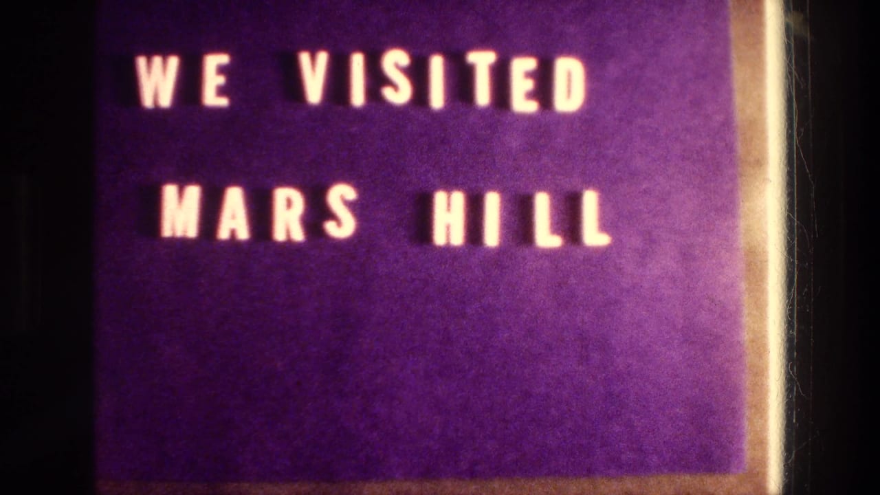 Purple title card with white block letters reading WE VISITED MARS HILL.