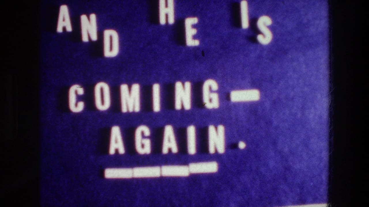 The filmed title card remains static, with white letters and underline bars visible against a purple field.