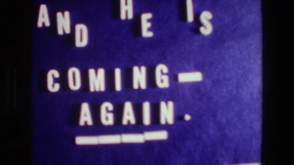 A softer, slightly shifted 8mm frame shows the same white-letter title card on purple cloth.