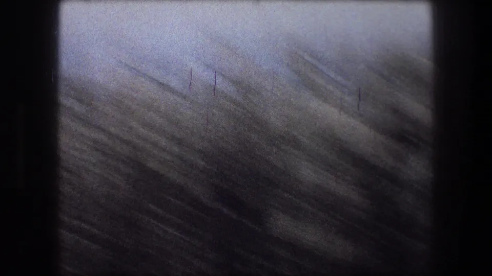 1976 8mm frame near Bethlehem showing streaked field texture or roadside ground blurred by vehicle motion.