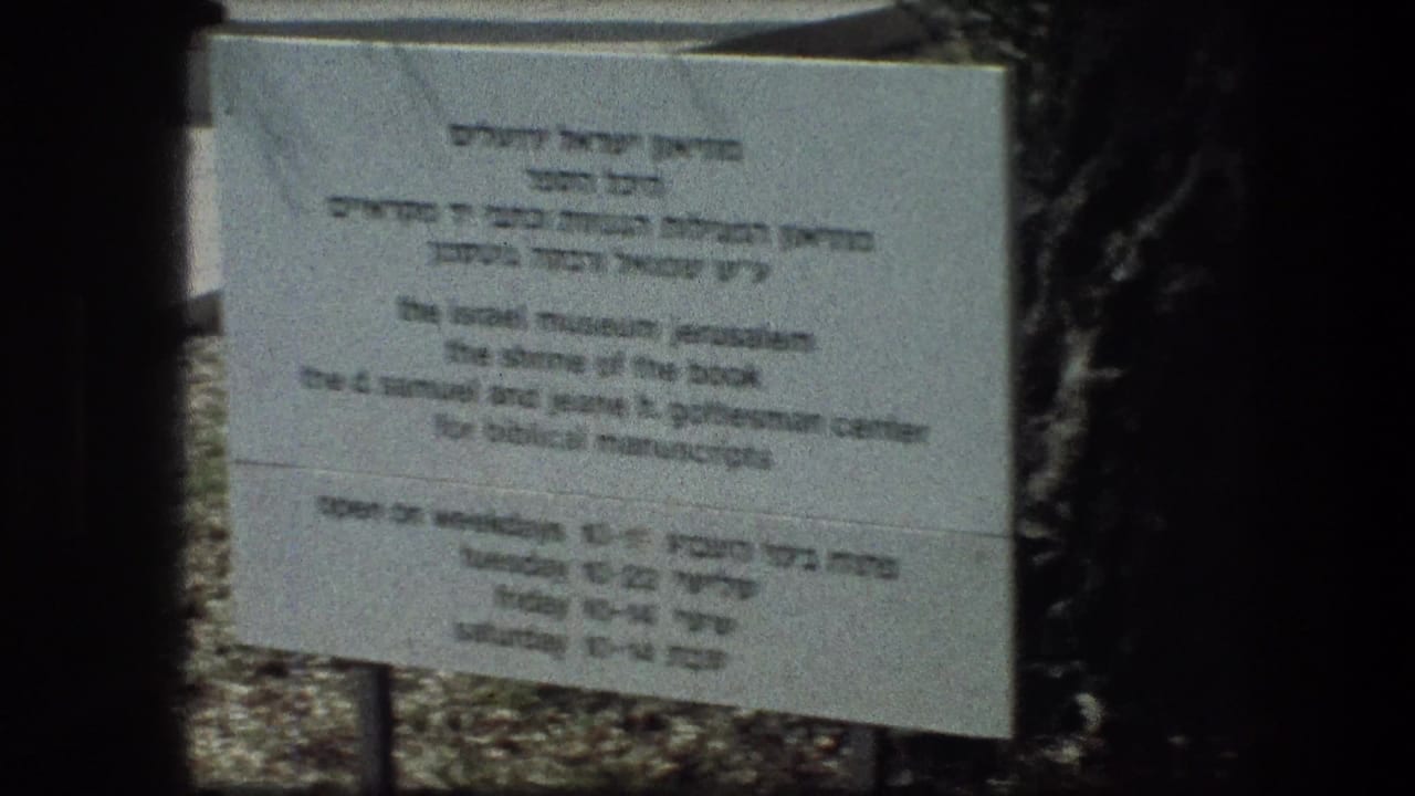Second view of the grey informational sign, slightly shifted in frame.