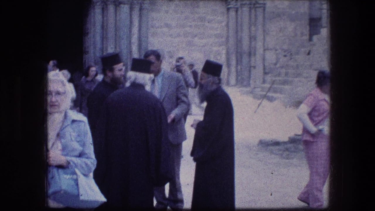 A handheld 1976 frame shows Orthodox clergy and tourists near the Garden Tomb stonework, with faces visible in the crowd.
