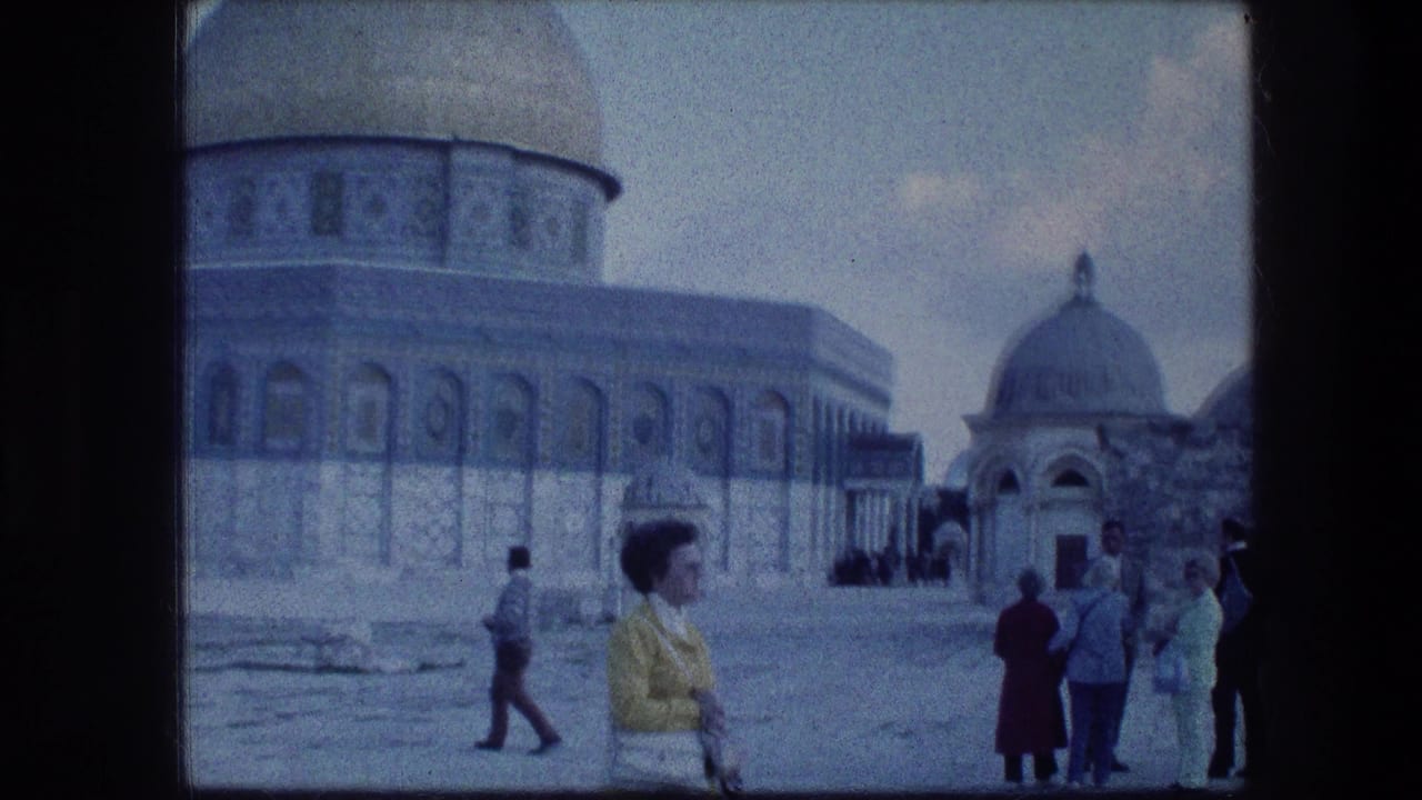 1976 8mm Jerusalem travel frame showing the Dome of the Rock, plaza paving, and visitors gathered near the foreground.