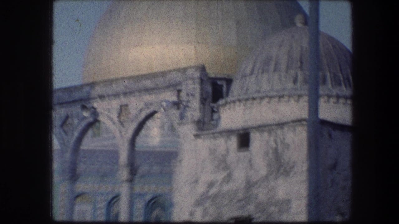 Domed roof, stone arches, and weathered wall details at a religious site.
