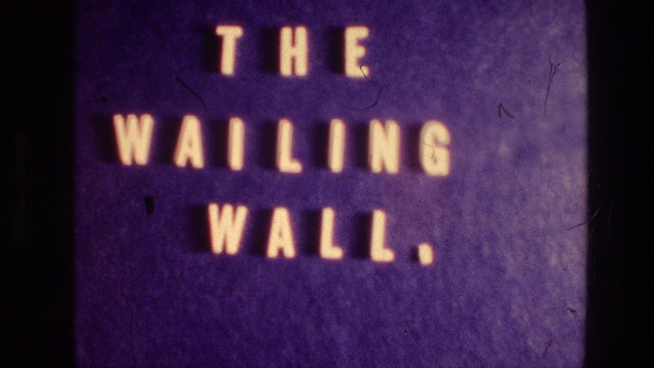 Second view of the THE WAILING WALL title card with dark film edge.