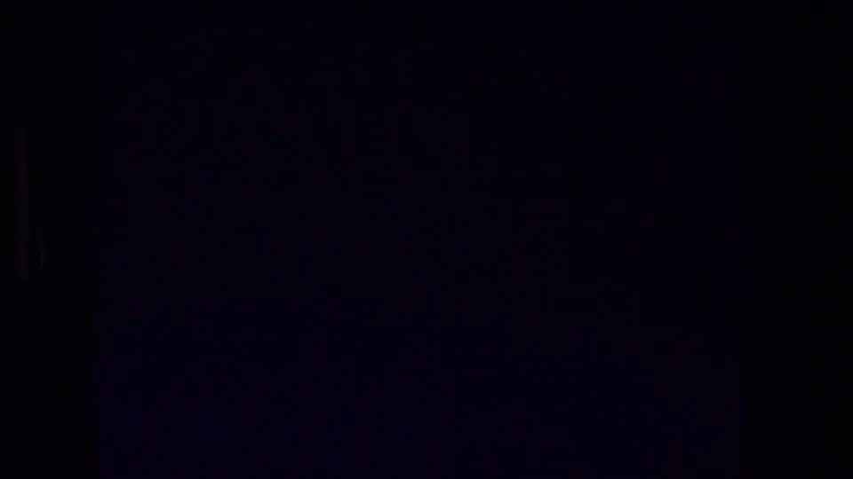 Dark 8mm transition frame between the Dome of the Rock title card and the Jerusalem panorama.