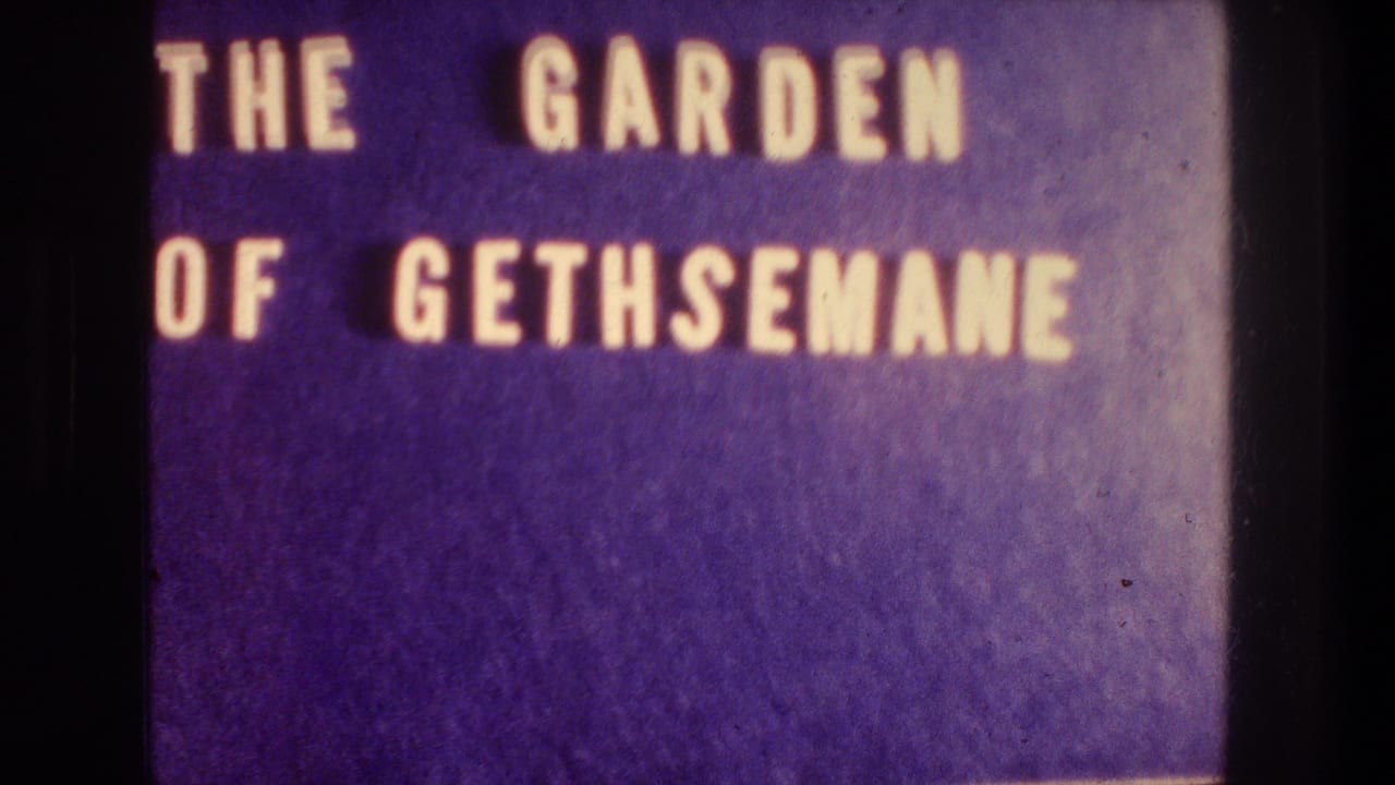 1976 8mm Jerusalem home-movie title card reading The Garden of Gethsemane in yellow letters on a purple background.