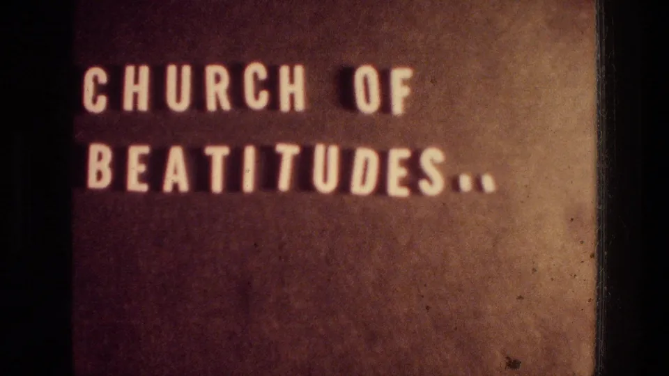 8mm travel title card reading Church of Beatitudes, supporting the supplied location context for the clip.