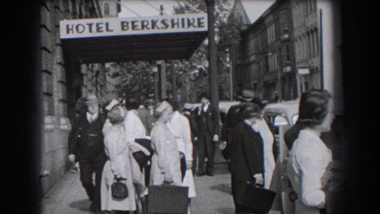 Reading, Pennsylvania hotel exterior with a sidewalk crowd, luggage, uniformed women, suited men, and the Hotel Berkshire sign overhead.