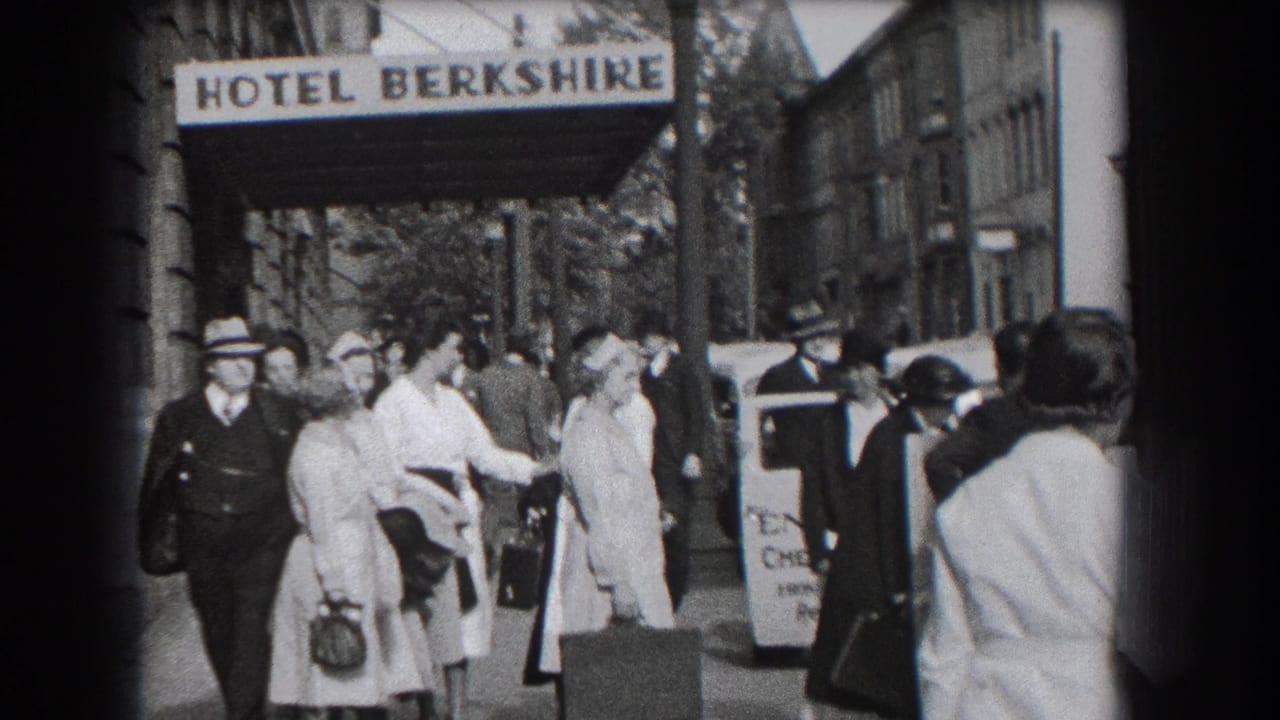 1938 Reading, Pennsylvania street scene with pedestrians in period dress beneath the Hotel Berkshire canopy.