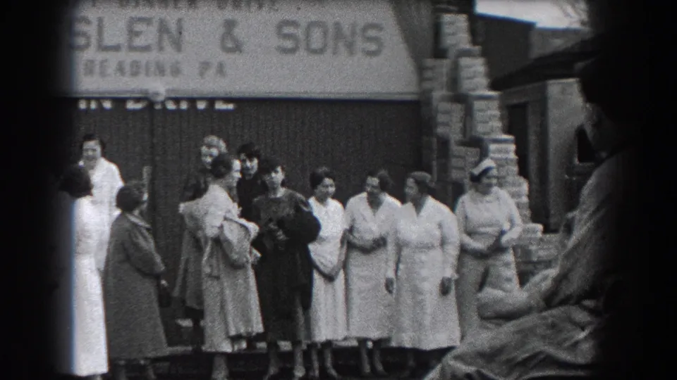 A 1938 Reading storefront scene shows adults talking outside R. Ensslen & Sons, with period clothing and hats visible.
