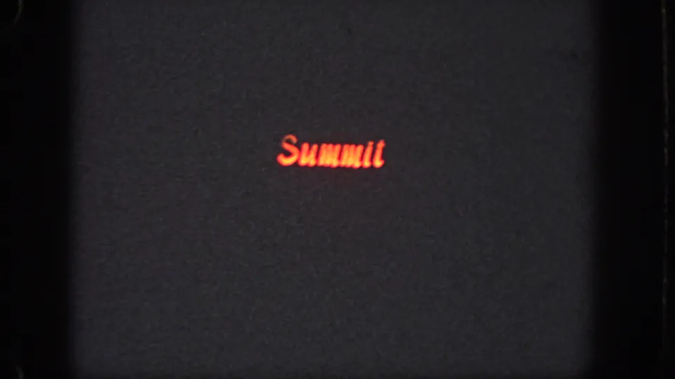 Final 1951 Georgia frame shows the red Summit logo against a dark, grainy background with black film borders.