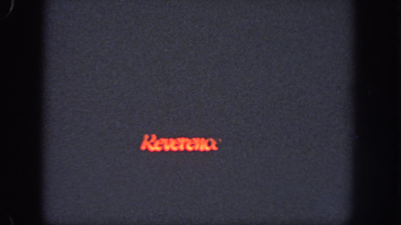 The final frame shifts to a dark field with red cursive lettering that appears to read Kewanee, though the word is uncertain.