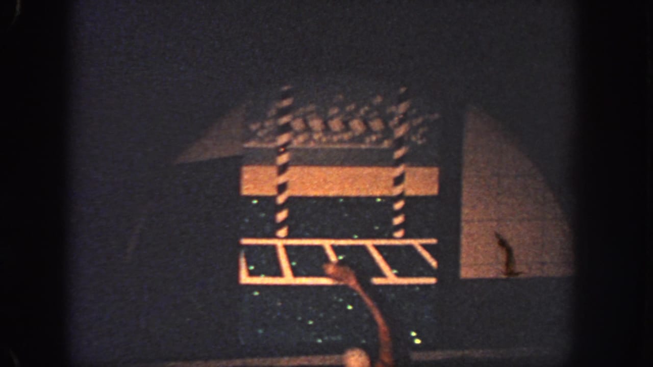 1951 Georgia 8mm frame may show a dark waterside structure with rails, faint orange light, and a possible swimmer or floating figure below.