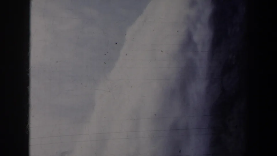 Soft 8mm frame of Niagara Falls mist and darker spray areas, with visible dust, scratches, and heavy side borders.