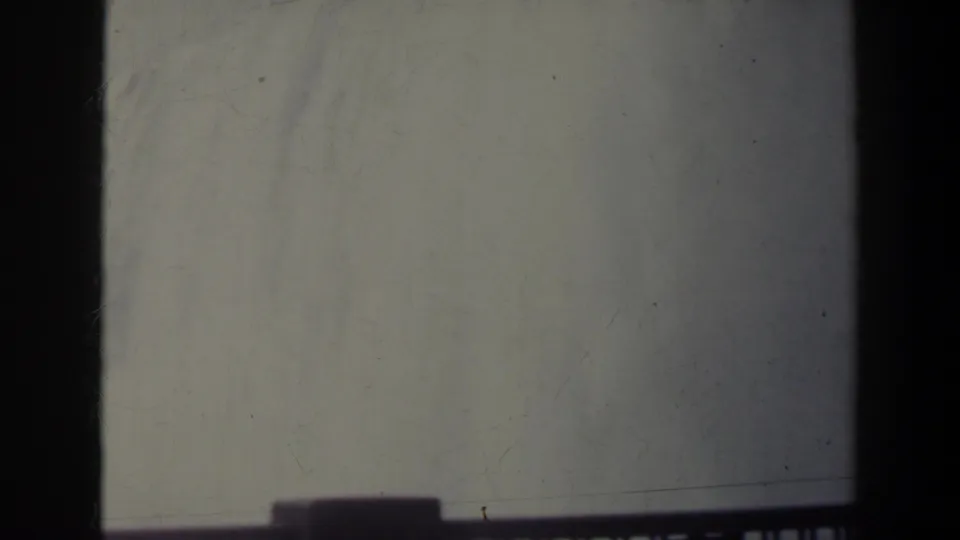 The final frame shows the Niagara Falls railing area without the man, with pale mist or wall surface and dark film borders visible.