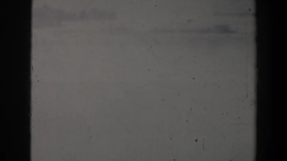Faded 8mm view from the Niagara Falls Canada clip, showing misty light and barely visible landscape forms.