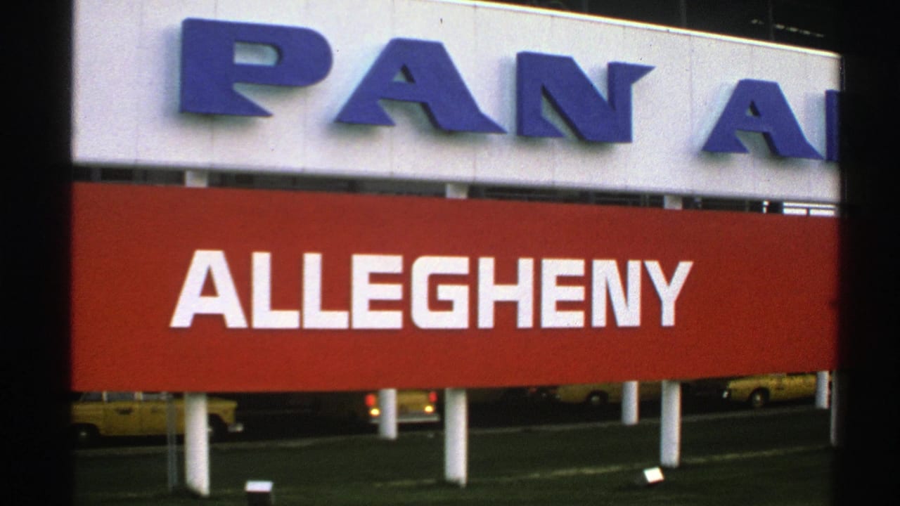 Large Allegheny County sign below partial Pan Am lettering.