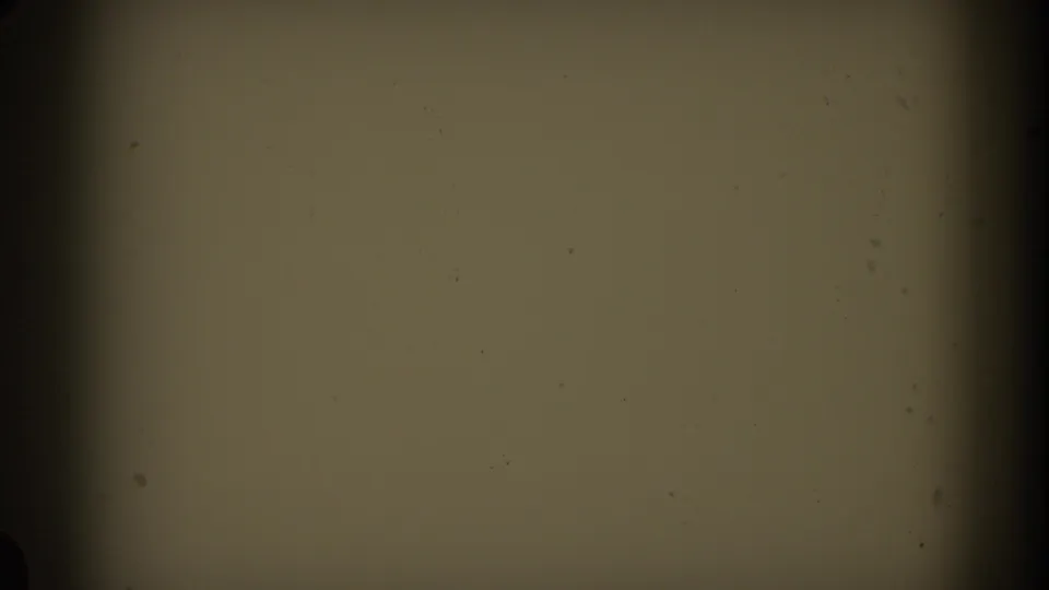 Faded 8mm frame from the Italy home movie, with a blank tinted field, central dark vertical band, grain, dust, and soft vignetting.