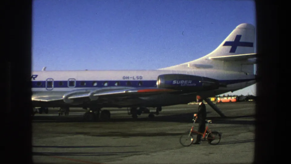 Final frame shows the Finnair Super Constellation tail and a person walking with a bicycle across the Stockholm airport tarmac.