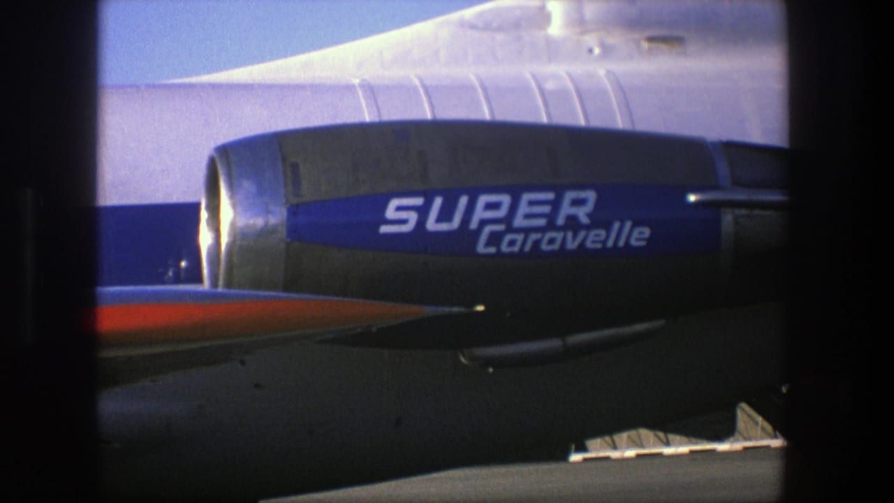 Blue Super Caravelle engine with silver aircraft body behind it.