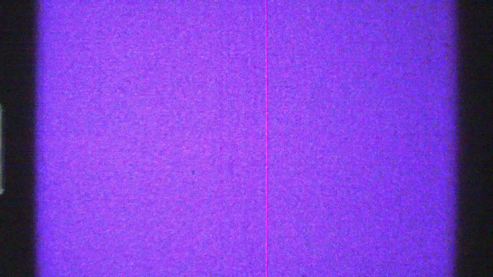 Arizona 1969 8mm frame of purple analog screen texture with a dark central band and film scratches.
