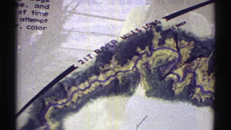 1969 Arizona 8mm frame returning to the drawn river map, with the “217 RIVER MILES LONG” note readable along the top of the river shape.