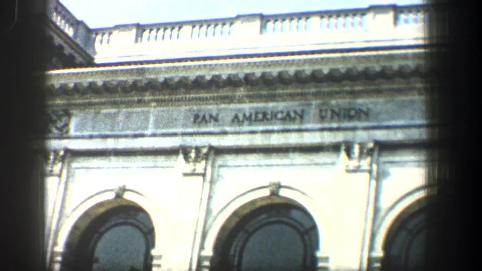 1961 Baltimore frame showing the Pan American Union inscription above arched windows on a classical stone facade.