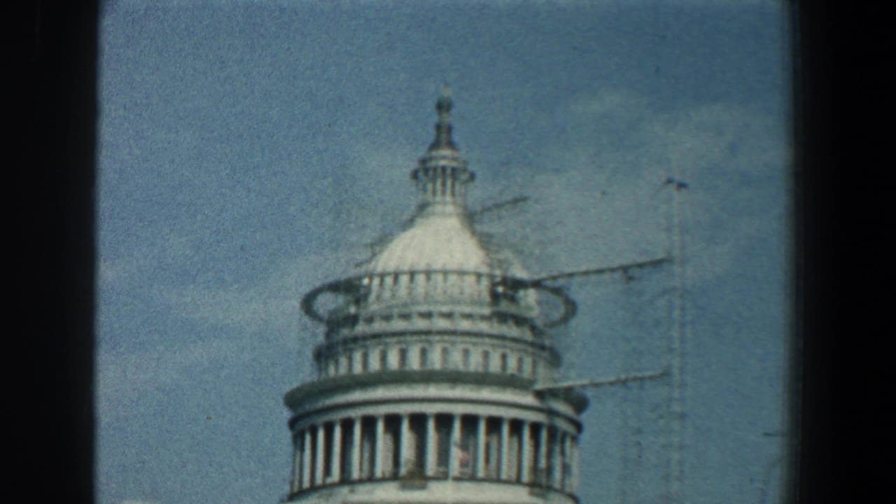 U.S. Capitol dome and upper facade seen through 8mm film borders.