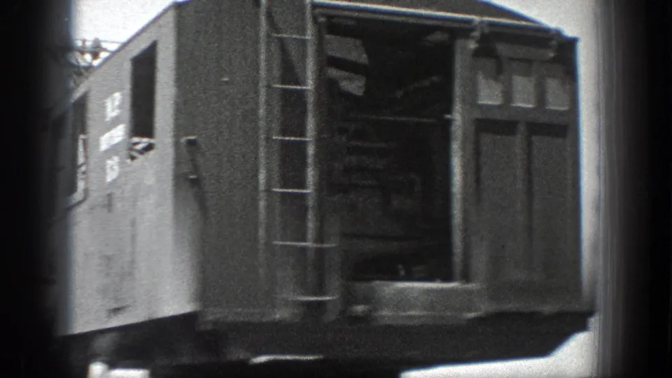 1936 California 8mm frame showing a large crane cab with a side ladder, paneled body, and open operator area.