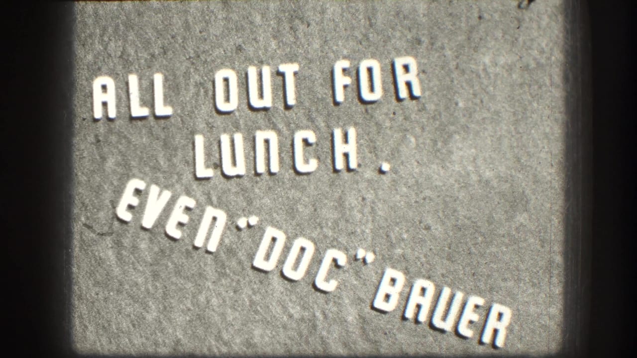 Gray title card reading ALL OUT FOR LUNCH. EVEN "DOC" BAUER.
