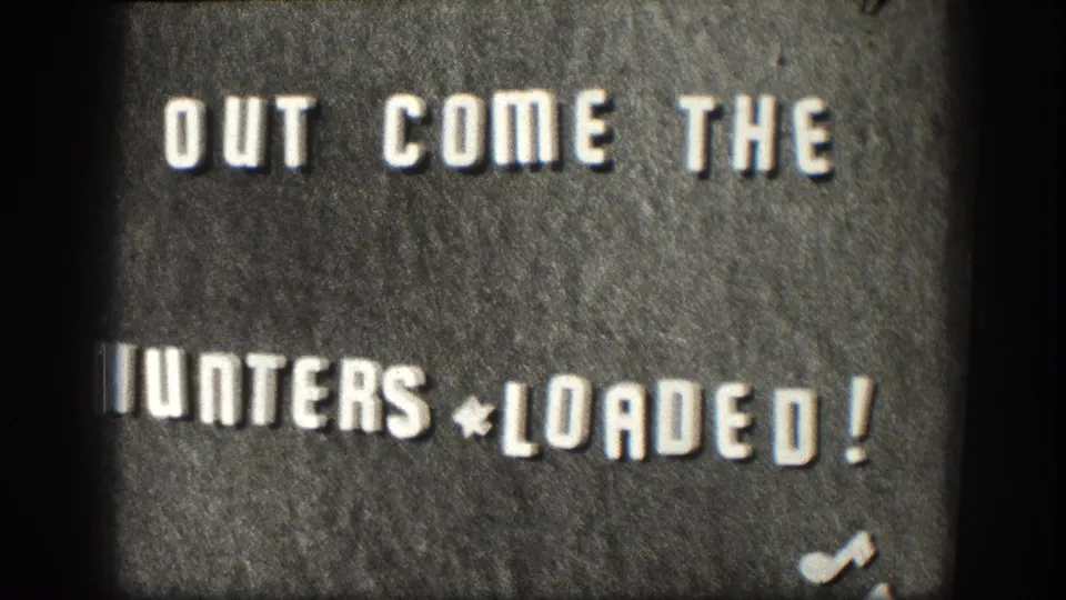 Black-and-white 8mm title-card frame from the 1958 Kansas reel, showing bold white hunting text against a dark card.