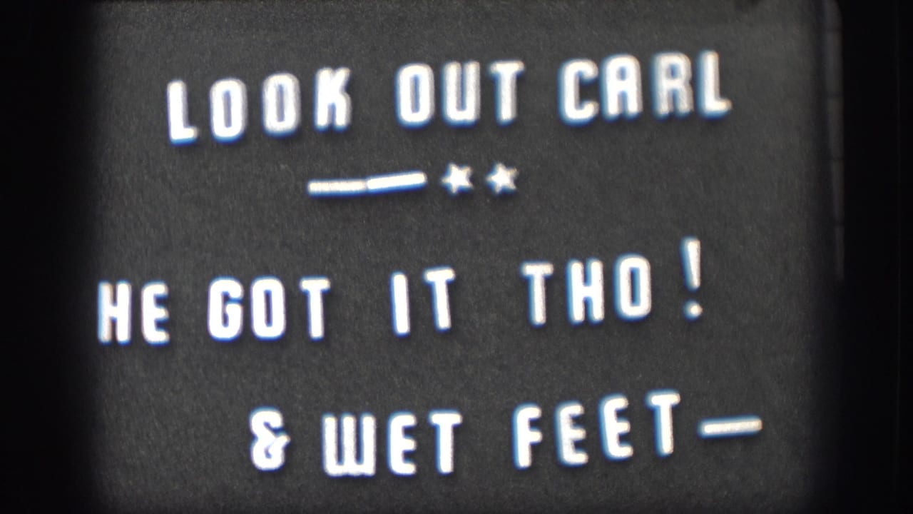 1958 Kansas 8mm title card with white lettering reading Look Out Carl and a note about wet feet.