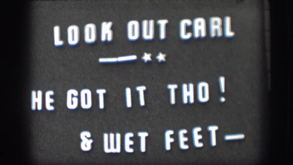 1958 Kansas 8mm title card with white lettering reading Look Out Carl and a note about wet feet.