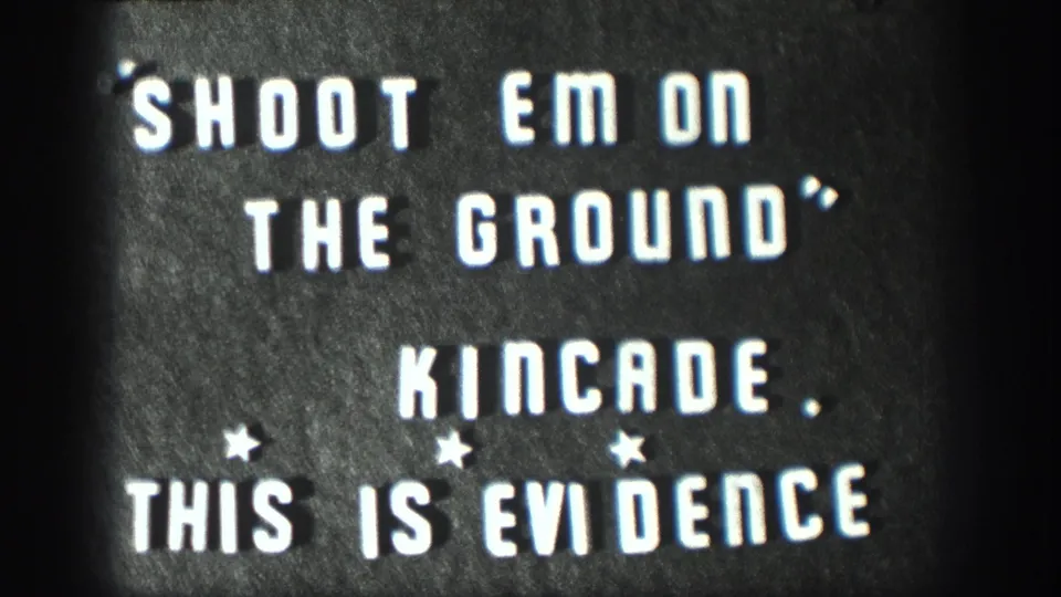 Black 8mm title card with white lettering reads SHOOT EM ON THE GROUND, KINCADE, and THIS IS EVIDENCE.
