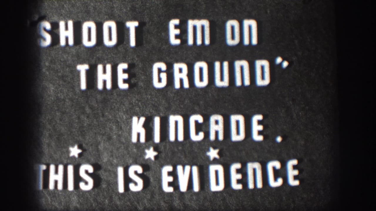 1958 Kansas 8mm frame of a dark title card with white block letters, star marks, and partially cropped wording.