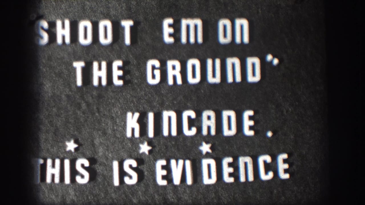 Kansas 1958 home-movie title card with high-contrast white lettering on a dark card and visible 8mm grain.
